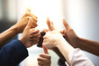 © peopleimages.com - Business people, hands and thumbs up for support, success and team work in office collaboration. Worker, group or circle in like, yes and okay gesture for good job, winning and well done with goals