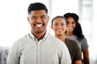 © peopleimages.com - Businessman, office and team in portrait with smile, confidence and trust in workplace. Startup, career and about us with diverse happy coworkers in company with unity, respect and collaboration