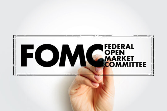 FOMC Federal Open Market Committee acronym - committee within the Federal Reserve System, conducts monetary policy for the U.S. central bank, text concept stamp