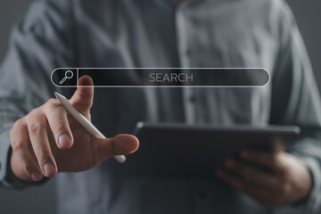 Wall Mural - man's hands are finger point to searching for information. using search console with your website. d