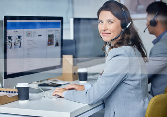 Leinwandbilder - Woman, portrait and call center in office with computer, headset and team for communication with screen. Operator, telemarketing and consultant with customer service for tech support, smile and crm.