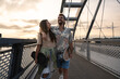© Srdjan - Simple living. Freedom as lifestyle. Young couple enjoying outdoor and sunset. Having fun on nice weather. Man and woman, hipsters, generation Z with cool attitude.