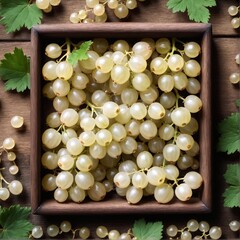 Canvas Print - Fresh white currant in box on wooden table background. Top view