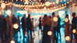 © Maksym - Blurred view of a bustling office party with business people networking, elegant decor and soft lighting setting the scene