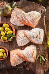 Wall Mural - Tasty buns made of olives and wheat flour.