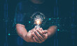 © krungchingpixs - Artificial intelligence or AI of futuristic technology concept, Hands holding light bulb with virtual AI technology, Internet of Things, futuristic innovation, smart communication network.