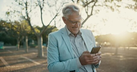 Canvas Print - Funny, phone and mature businessman in city for walking with social media, meme or gif communication at sunset. Smartphone, travel or professor laughing at app for university, comic or newsletter