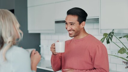 Canvas Print - Happy couple, talking and drinking coffee in home kitchen with latte for morning breakfast together. Man, woman and tea cup for funny conversation, laughing and interracial people bonding in house