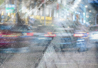 Wall Mural - wet asphalt road with city traffic and car lights trails. multi exposed urban image at rainy night.