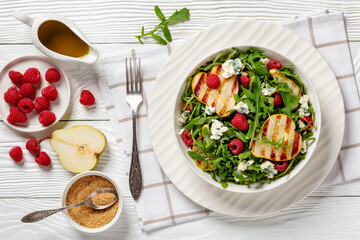 Wall Mural - grilled pear salad with cheese, arugula, berries