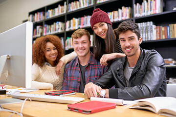 Wall Mural - Diversity, friends and portrait with computer in library for education, learning or discussion on project. University, online and group of students for scholarship, knowledge or working on assignment