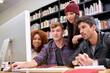 © peopleimages.com - Education, library and team of students on computer for exam, learning knowledge and friends research test. University, desktop and group of people studying together for online discussion in college