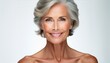 © ULFATRAZA - Beautiful gorgeous 50s mid aged mature woman looking at camera isolated on white Mature old