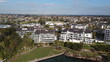 © HDC Creative - Aerial drone view of waterfront property and houses
