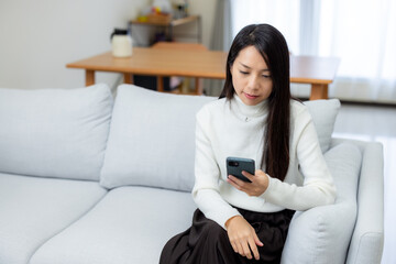 Sticker - Woman use of mobile phone at home