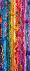 Wall Mural - A colorful piece of fabric with a rainbow of colors and pom poms