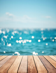 Wall Mural - Wood table top on blur sparkling sea water and summer sky background