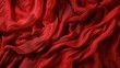 © Fay Melronna  - A close-up of flowing red fabric with intricate folds and luscious textures, creating a sense of elegance and movement in vibrant color.