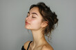 © MagnusCort - A close up of a woman's face with her eyes closed looking to a side