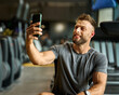 © Lumos sp - gym sport fitness exercise health healthy training phone selfie photo portrait self posing camera technology smartphone mobile break cellphone running
