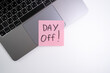 © Iuliia Pilipeichenko - Day off - workplace message in the office. Concept of absence from work and day off