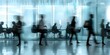 © Anastasiia - Blurry businesspeople in modern office setting with glass walls. Concept Blurred Businesspeople, Modern Office, Glass Walls, Corporate Environment
