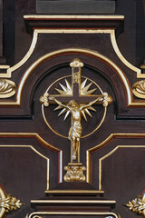 Wall Mural - Jesus on the cross on the main altar in the church of St. Clare of Assisi in Zagreb, Croatia