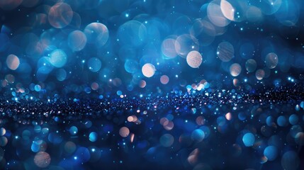 A beautiful blue glitter background with sparkling lights. Perfect for a festive or elegant background.