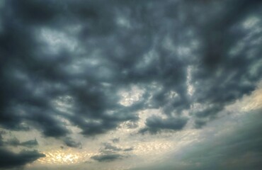 Sunset on blue sky. Blue sky with some clouds. blue sky clouds, summer skies, cloudy blue sky background.