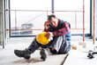© Halfpoint - Injured worker with wound on head, head injury. Work injury, accident in workplace.