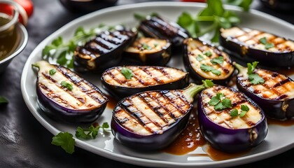 Wall Mural - A closeup of fresh grilled eggplants on a plate
