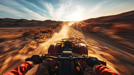 Atv desert ride at sunset. First person view of an ATV driving fast through the desert as the sun sets, kicking up dust.