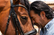 © ADDICTIVE STOCK - Man and horse sharing an emotional bonding moment