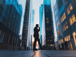 © Antonio - Silhouette of a professional walking in a modern cityscape with tall glass buildings, capturing the essence of urban business life at sunset, ideal for corporate themes and city lifestyle visuals.