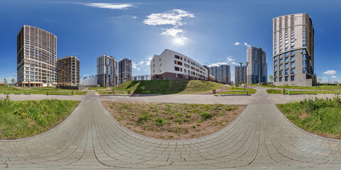 Wall Mural - hdri 360 panorama near skyscraper multistory buildings of modern residential quarter complex in full equirectangular seamless spherical projection