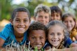 © Chacmool - Portrait of a group of children smiling at camera in the park