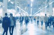 © LimeSky - Blurry images of a trade fair in a large hall with people presenting products and activities