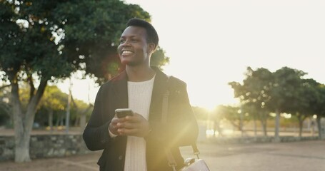 Canvas Print - Business, black man and walking on phone outdoor for morning commute, work travel and happy for sunlight. Professional, employee and smartphone with typing, text message and notification for journey