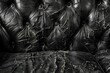 © LimeSky - Old black leather sofa with ripped upholstery on textured background
