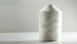 © LimeSky - Recycled PET or Crushed plastic bottles Raw White Polyester Yarn on spool white background