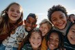 © Chacmool - Group of happy multicultural children looking at camera and smiling on sunny day