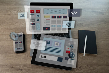 Wall Mural - creative web content design studio with flying website page layout seo technology businessman hand d