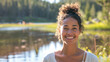 © Keitma - Portrait of a content woman in her 30s in middle of nature near a lake