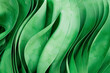 © Westend61 - Full frame of green colored abstract futuristic waves