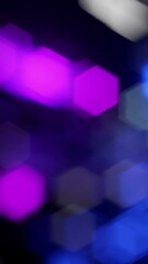 Wall Mural - This is a stock motion graphics shows vertical lens bokeh in a seamless loop.