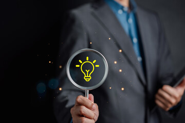 Aufkleber - Businessman holding Light bulb icon which for mind, creative, idea, innovation, motivation planning development leadership and customer target group concept.