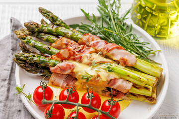 Wall Mural - Grilled asparagus with bacon and egg sauce