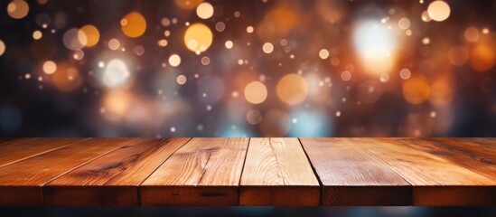 Poster - Use a wood table as a backdrop for your products with a bokeh light abstract background to create a stunning copy space image