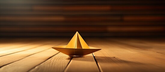 Wall Mural - An adorable origami paper boat displayed on a wooden surface with a clear copy space image available