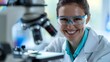 © CYBERUSS - Enthusiastic Young Female Researcher Exploring Scientific Discoveries in Laboratory Setting